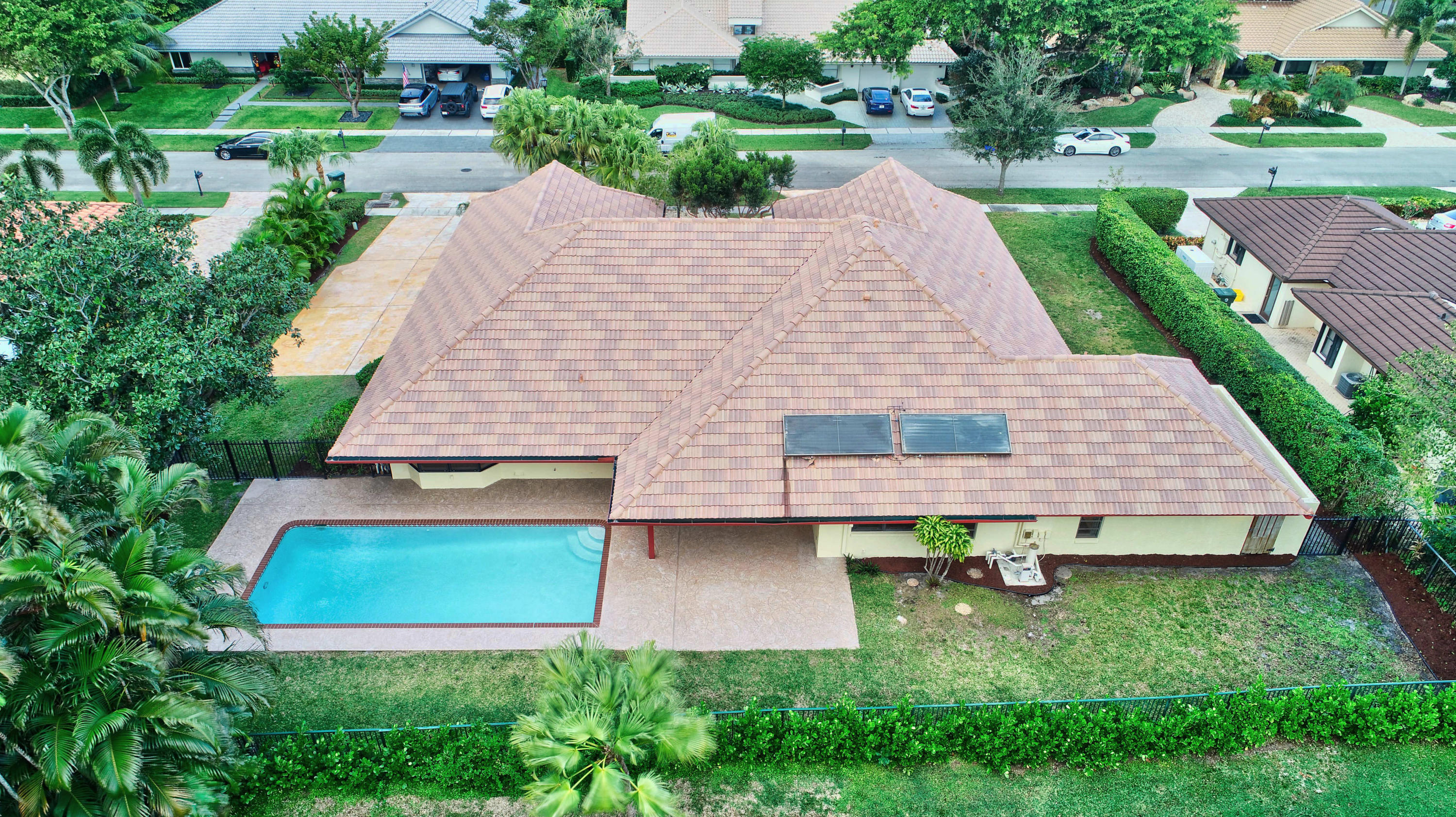 3230 St James Drive Boca Raton, FL 33434 - Photo 3 of 62 a aerial view of a house with yard and plants