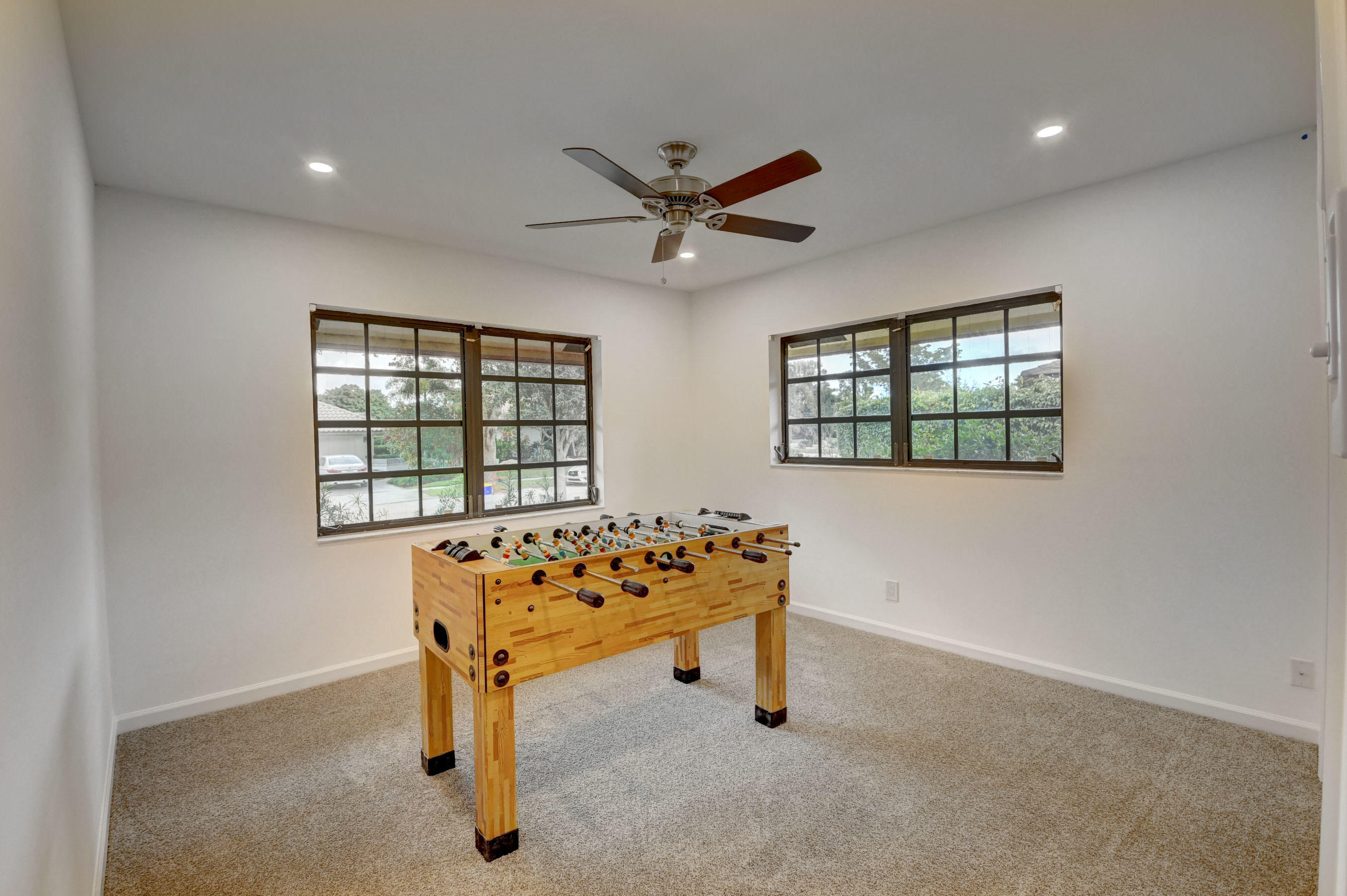 3230 St James Drive Boca Raton, FL 33434 - Photo 34 of 62 a white room with windows