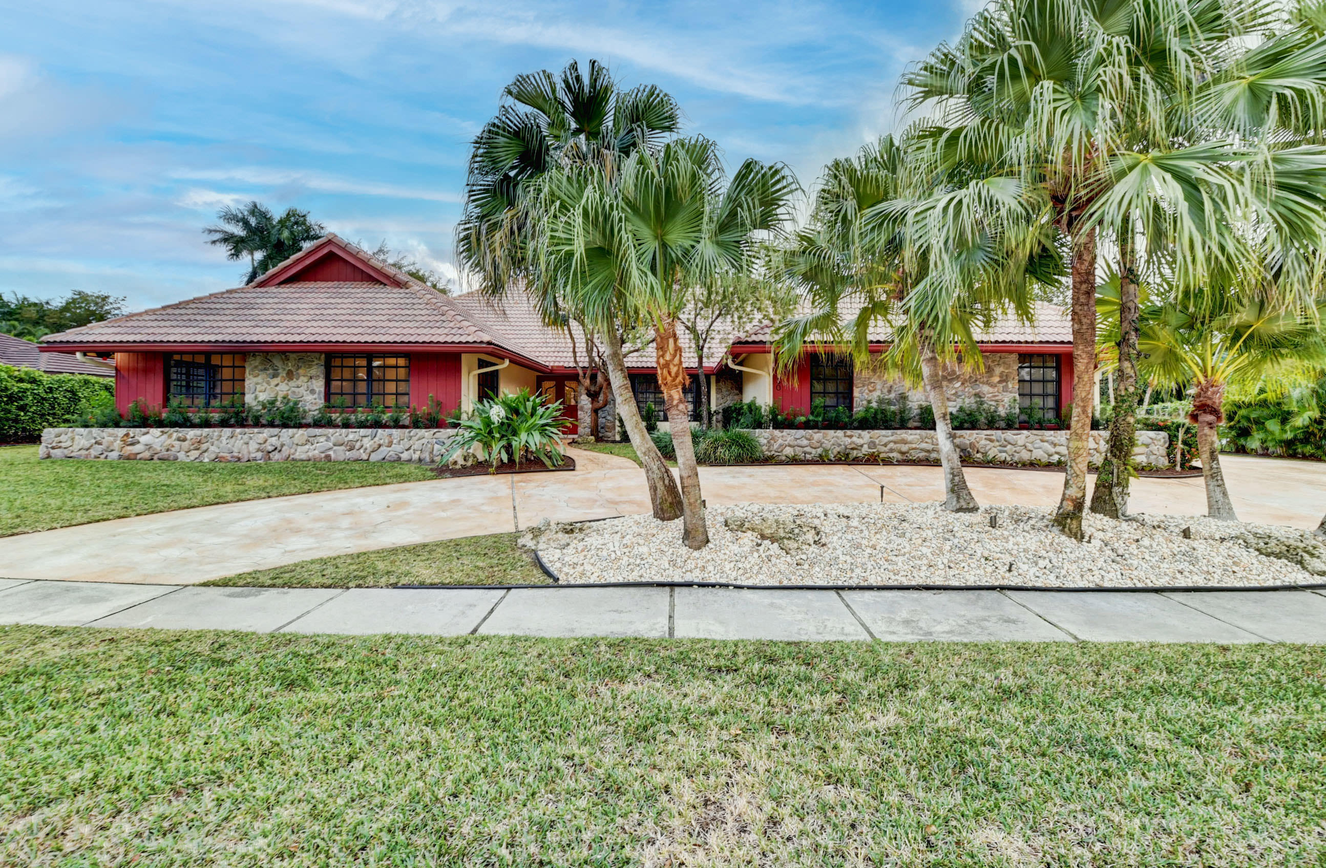 3230 St James Drive Boca Raton, FL 33434 - Photo 62 of 62 a front view of a house with a garden