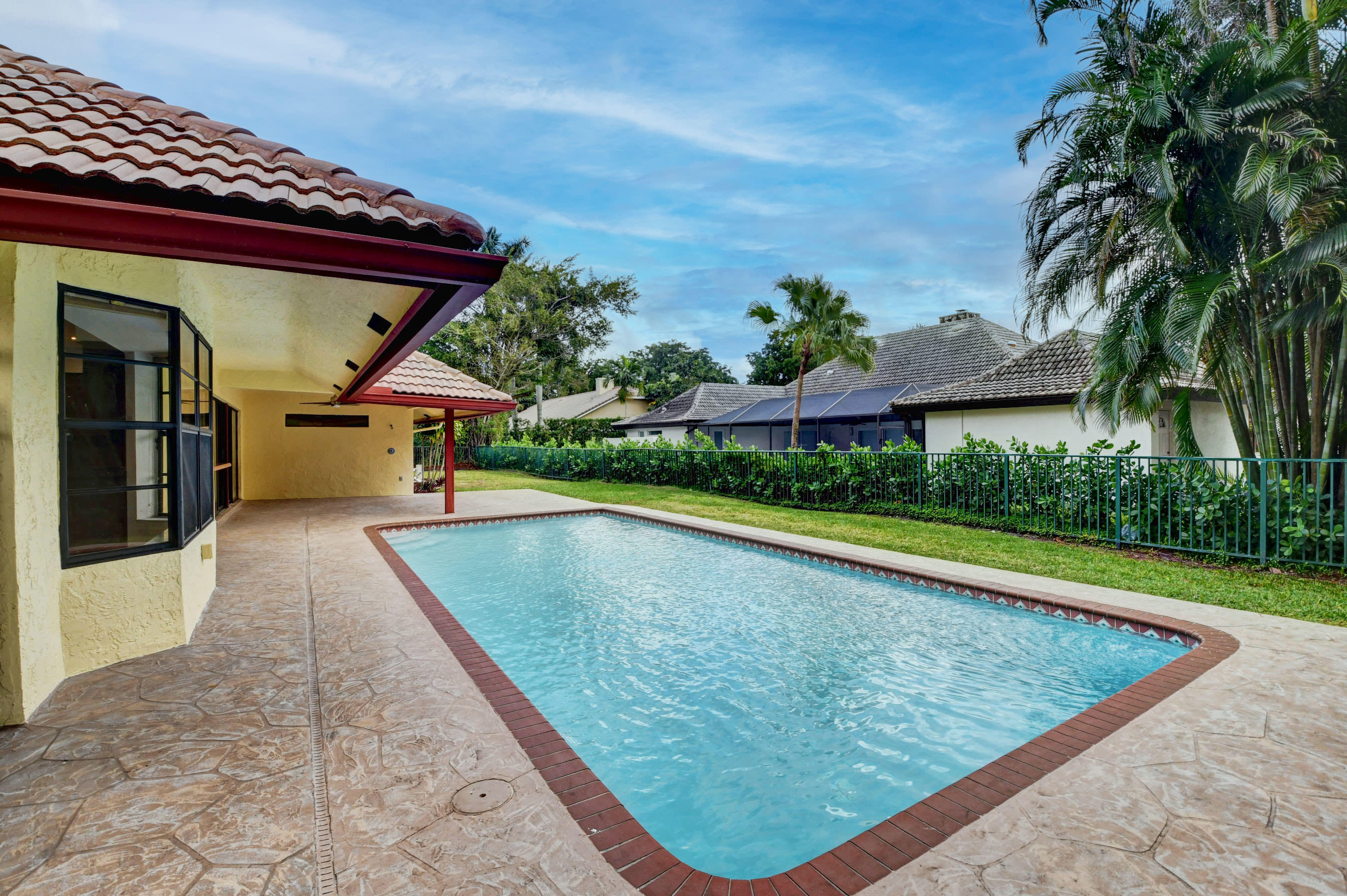 3230 St James Drive Boca Raton, FL 33434 - Photo 10 of 62 a view of outdoor space and swimming pool