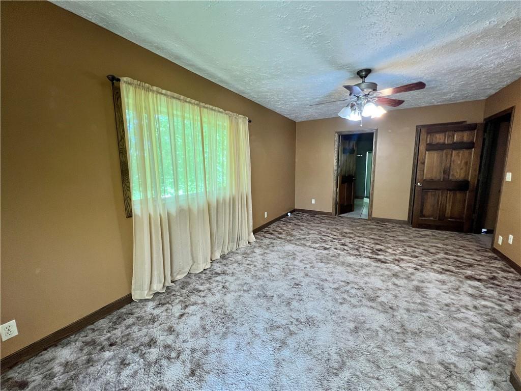 4293 Wampum Road New Castle, PA 16102 - Photo 11 of 16 a view of an empty room with a window