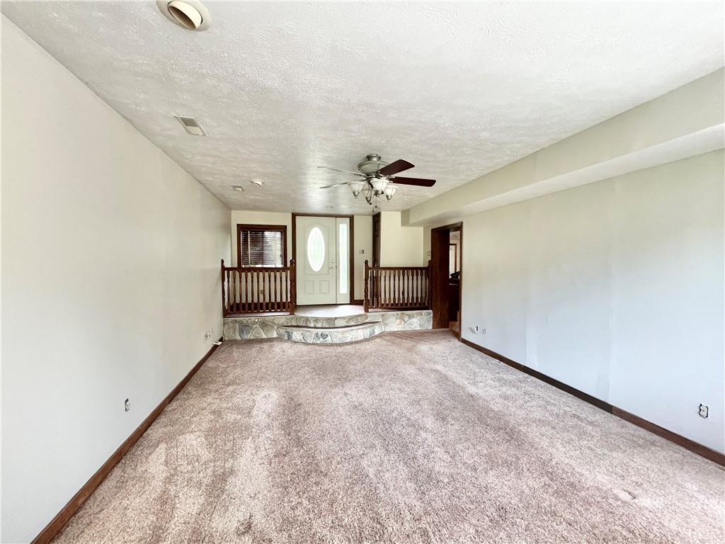 4293 Wampum Road New Castle, PA 16102 - Photo 5 of 16 an empty room with windows