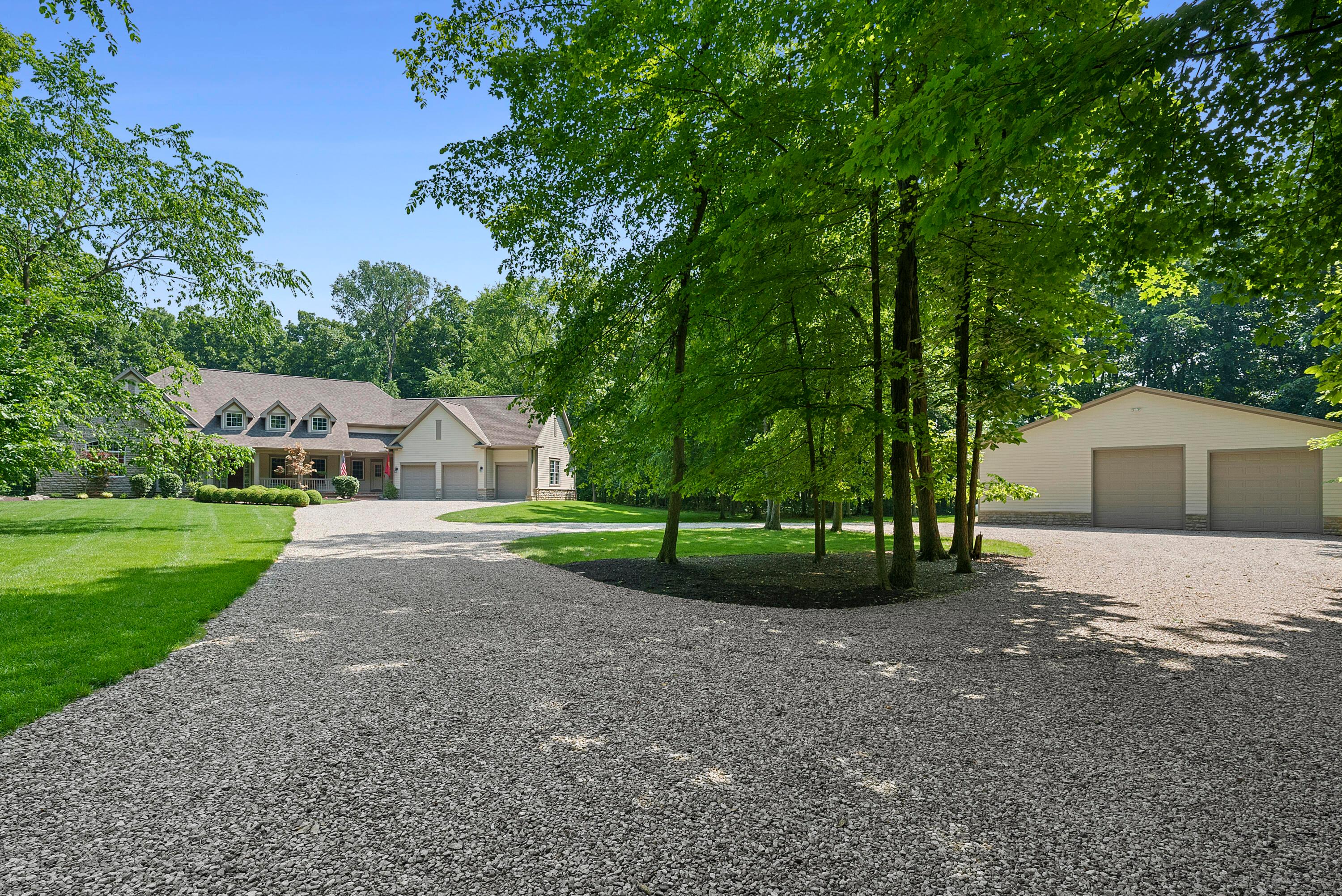 5761 Hughes Road Galena, OH 43021 - Photo 6 of 43 Extensive landscaping all around adds to the natural beauty of the property.