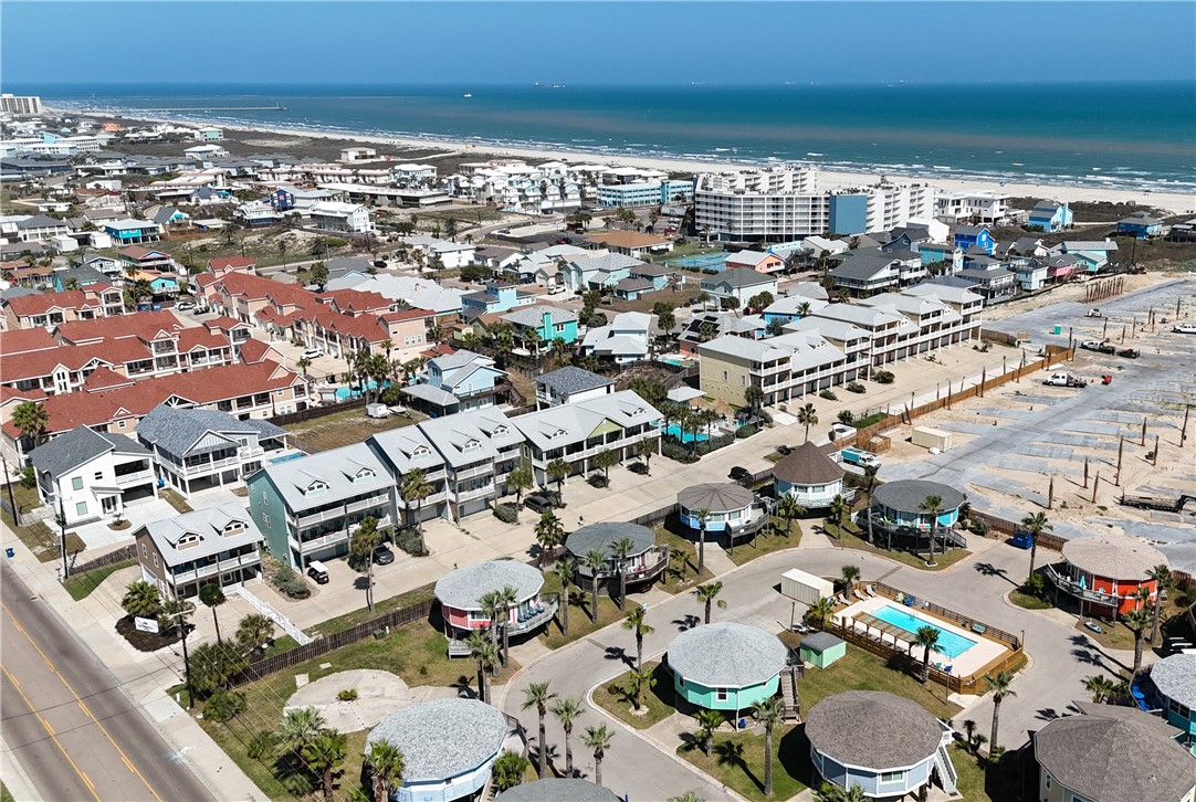 1833 Eleventh Street, Unit F2 Port Aransas, TX 78373 - Photo 38 of 40 an aerial view of residential houses with outdoor space