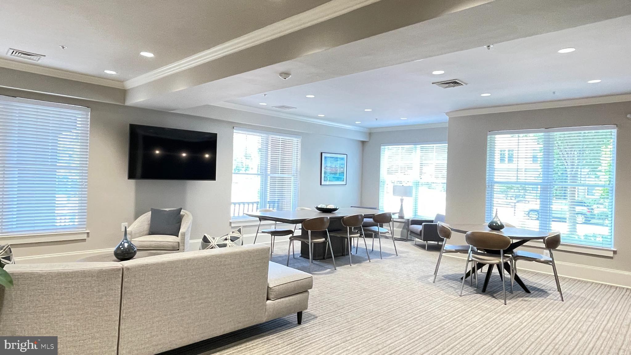 11800 Old Georgetown Road, Unit 1314 Rockville, MD 20852 - Photo 6 of 43 New common room by the main entrance
