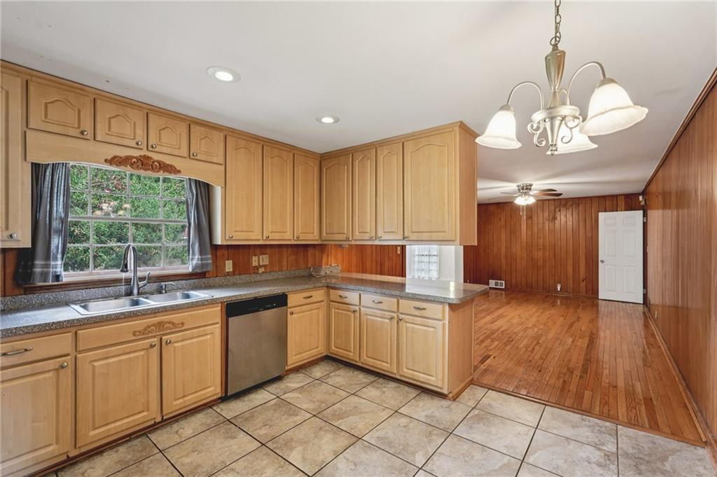 3407 West Manor Lane Southwest Atlanta, GA 30311 - Photo 13 of 36 a kitchen with a sink cabinets and window