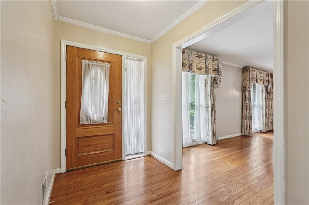 3407 West Manor Lane Southwest Atlanta, GA 30311 - Photo 2 of 36 a view of entryway with wooden floor