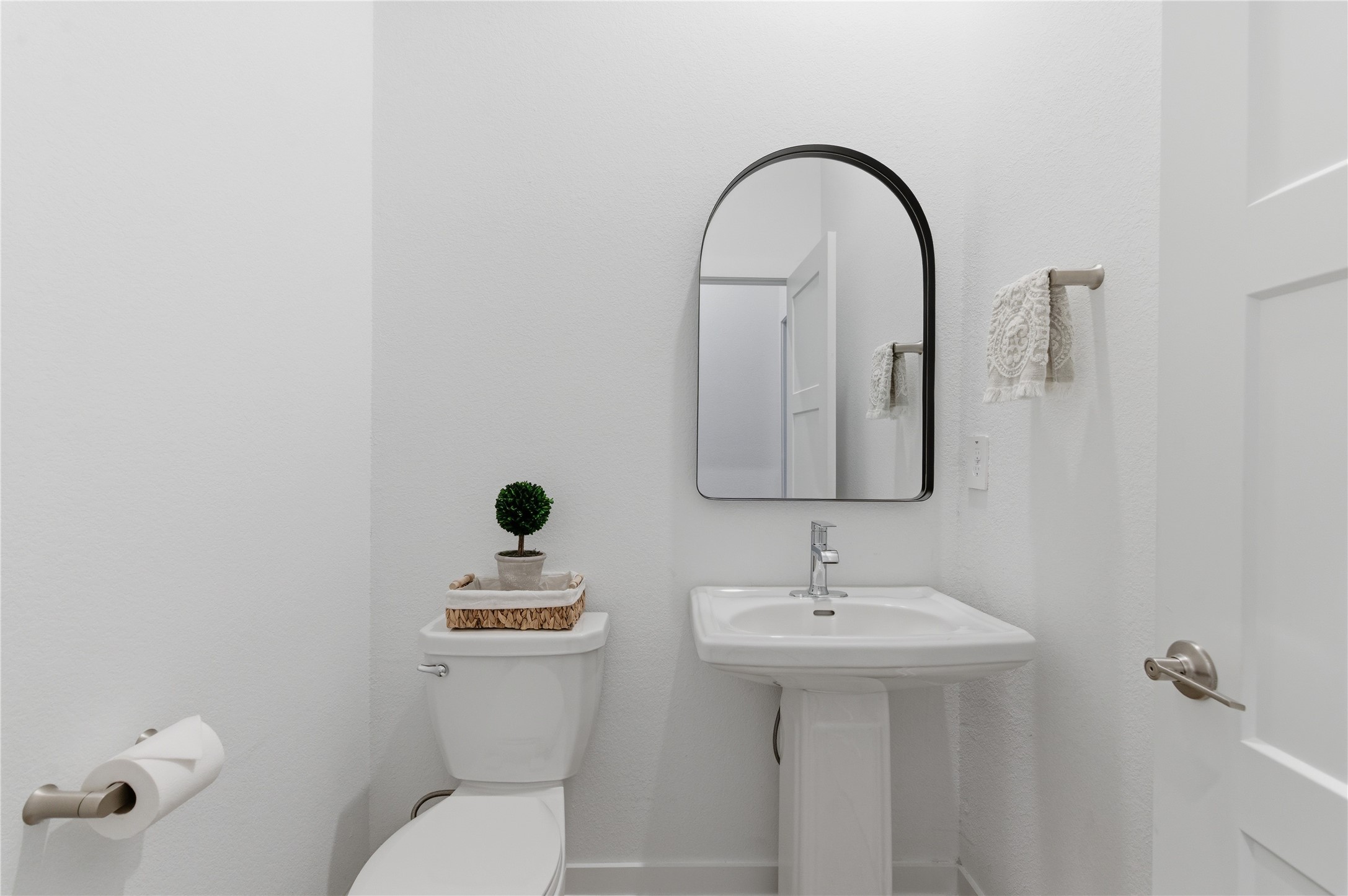 14108 Redfish Lake Conroe, TX 77384 - Photo 19 of 37 a bathroom with a sink a toilet and a mirror