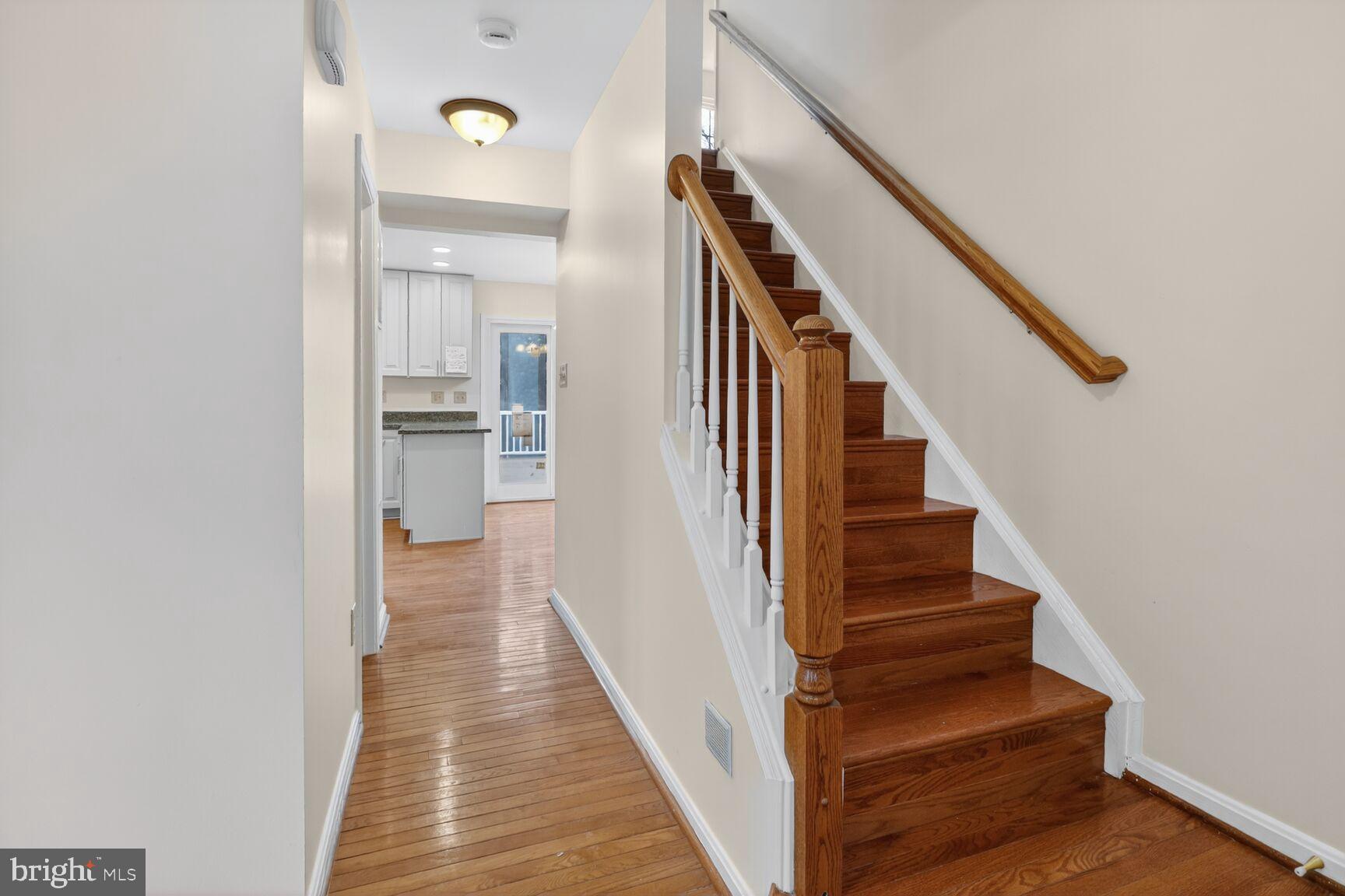 64 Foxwell Bend Road Glen Burnie, MD 21061 - Photo 8 of 38 Inviting entryway with elegant staircase.