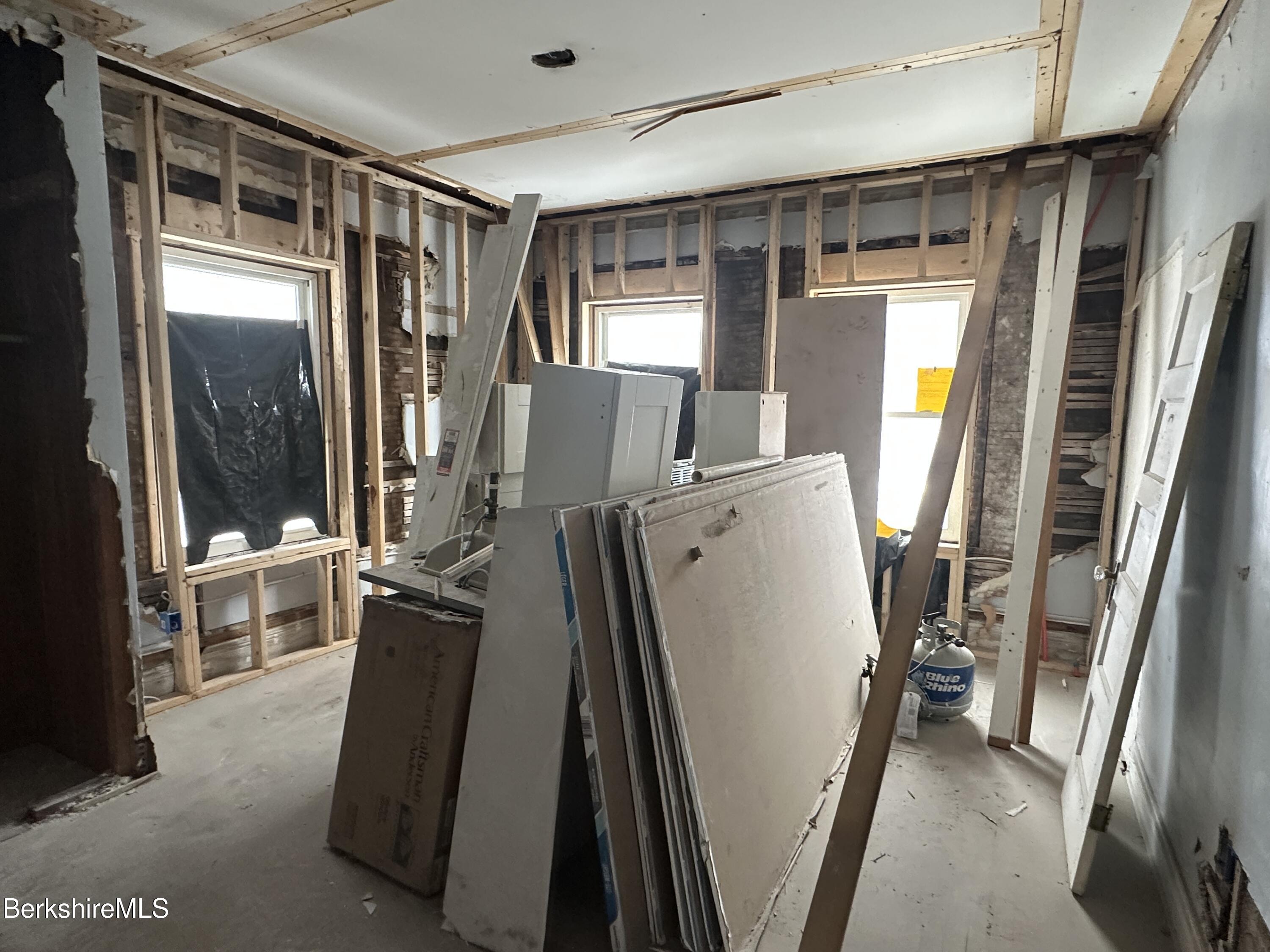 131 State Street North Adams, MA 01247 - Photo 14 of 32 a view of a hallway with furniture and shower