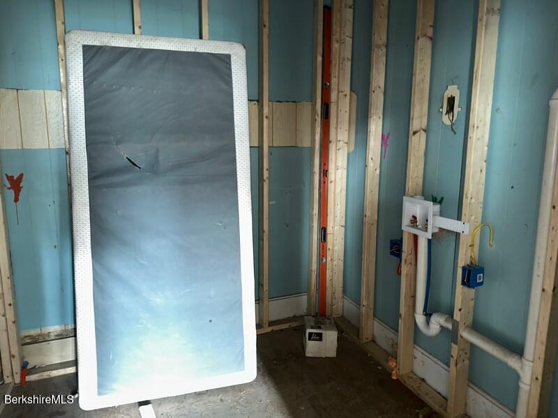 131 State Street North Adams, MA 01247 - Photo 15 of 32 a bathroom with a shower and a mirror