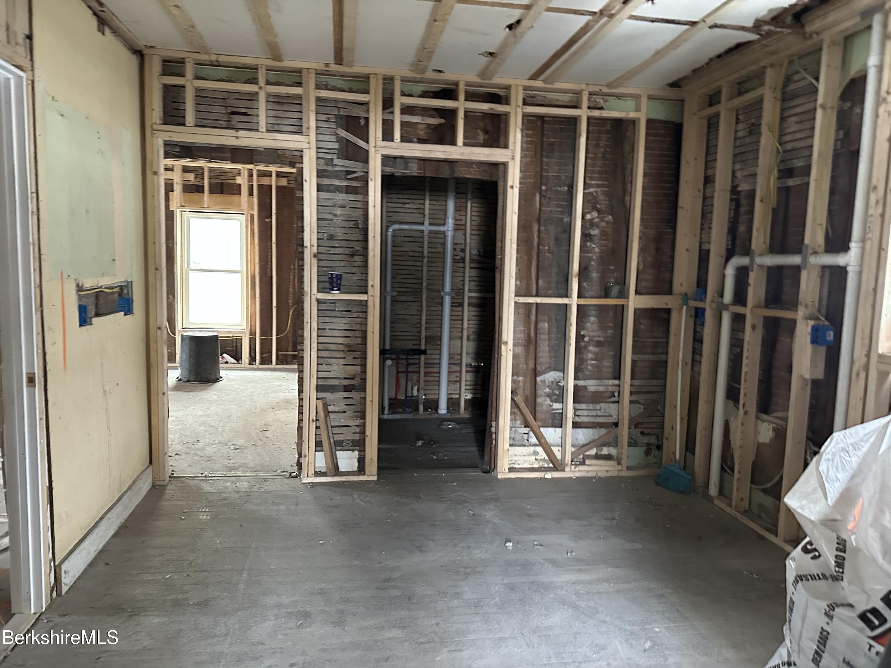 131 State Street North Adams, MA 01247 - Photo 19 of 32 a view of an empty room with wooden floor