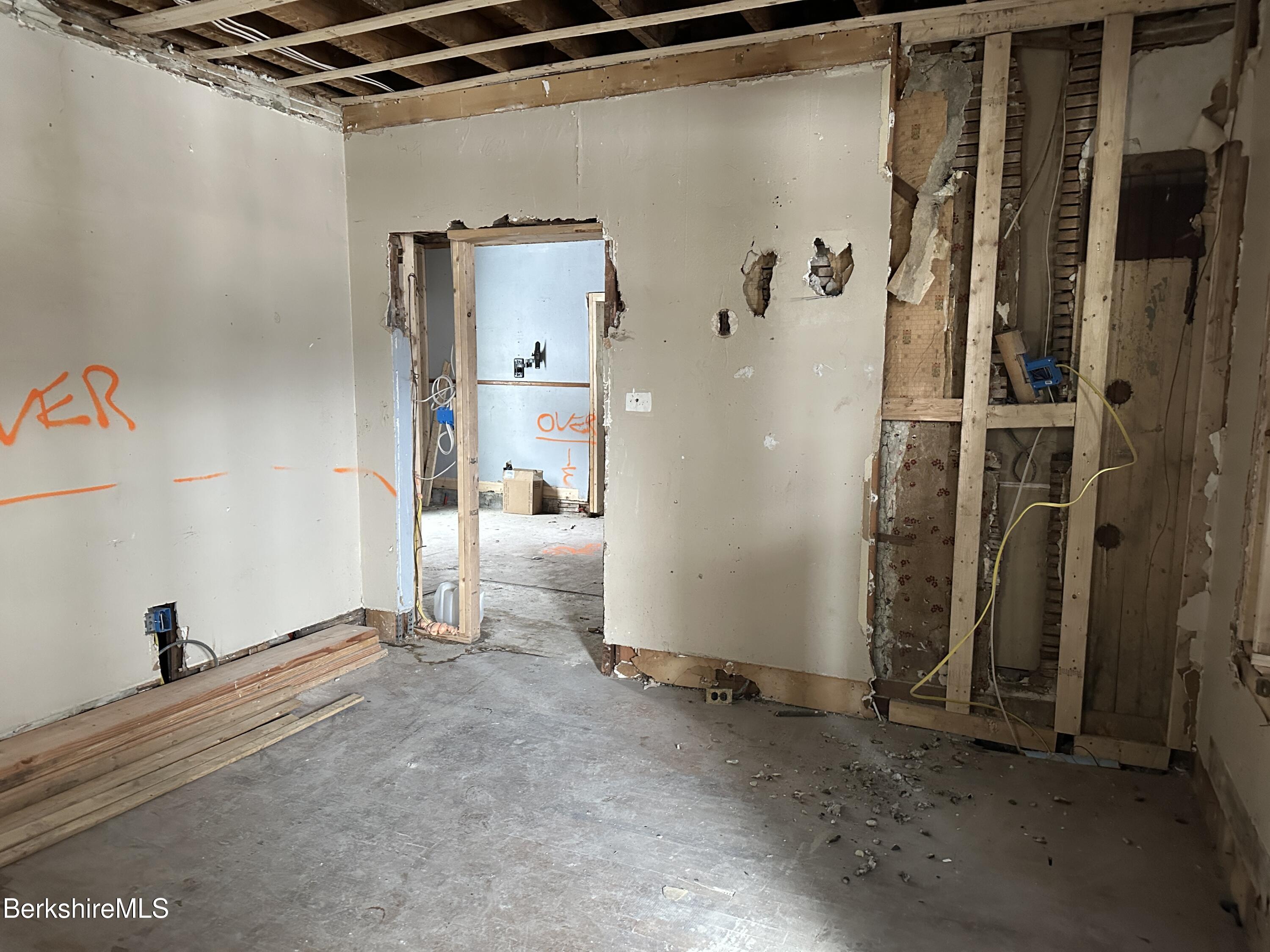 131 State Street North Adams, MA 01247 - Photo 10 of 32 a view of a closet area with living room