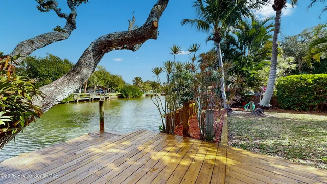 an aerial view of a house with swimming pool yard and outdoor seating
