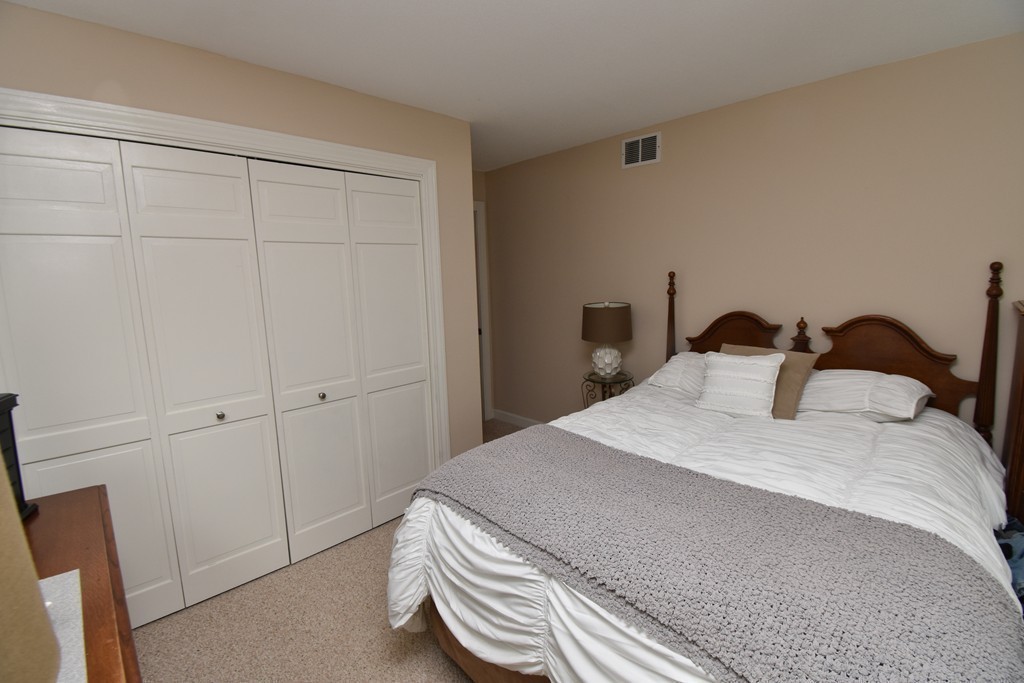 286 Main Road Montgomery, MA 01085 - Photo 17 of 27 a bedroom with a bed and a closet