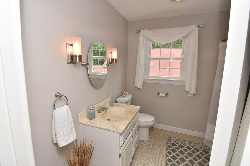 286 Main Road Montgomery, MA 01085 - Photo 20 of 27 a bathroom with a sink toilet and mirror