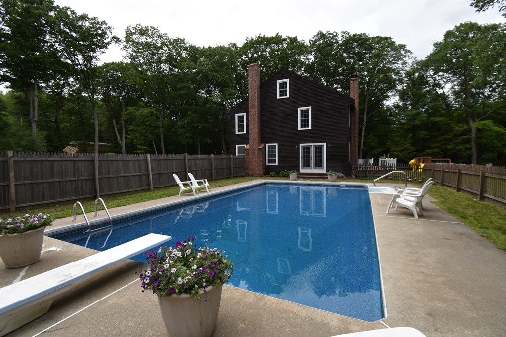 286 Main Road Montgomery, MA 01085 - Photo 22 of 27 a view of a chairs and table in the patio