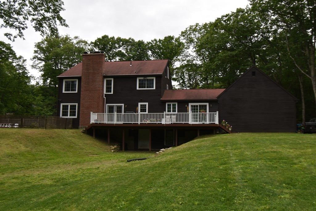 286 Main Road Montgomery, MA 01085 - Photo 23 of 27 a front view of a house with a garden