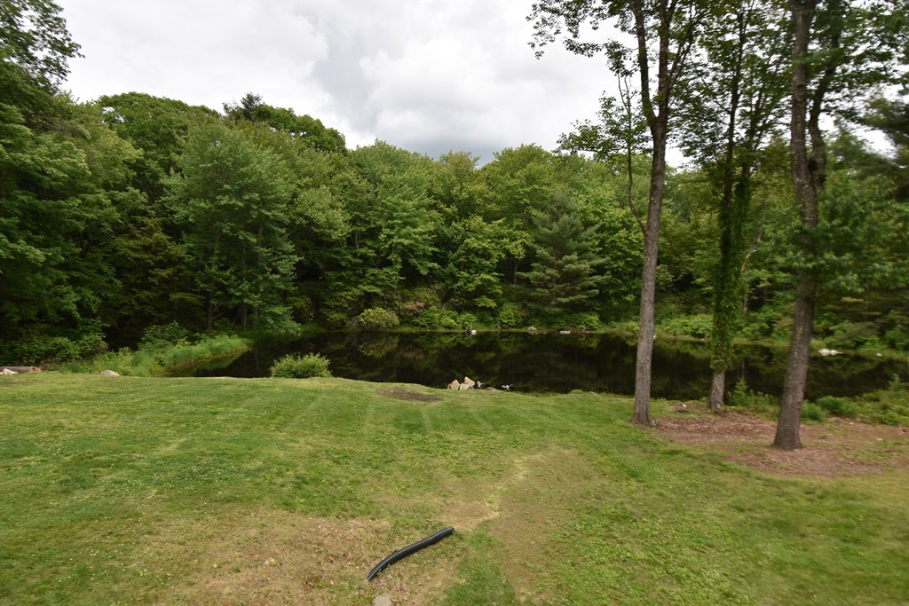 286 Main Road Montgomery, MA 01085 - Photo 24 of 27 a view of green field with trees in the background