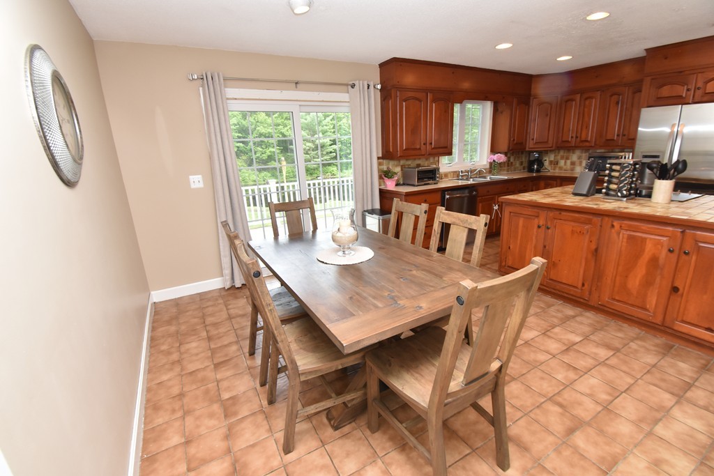 286 Main Road Montgomery, MA 01085 - Photo 6 of 27 a view of a dining room with furniture window and outside view