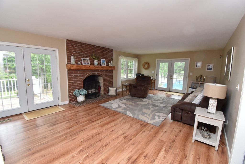 286 Main Road Montgomery, MA 01085 - Photo 9 of 27 a living room with furniture and a fireplace