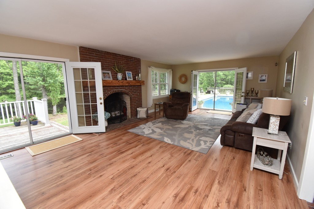 286 Main Road Montgomery, MA 01085 - Photo 10 of 27 a living room with furniture and a fireplace