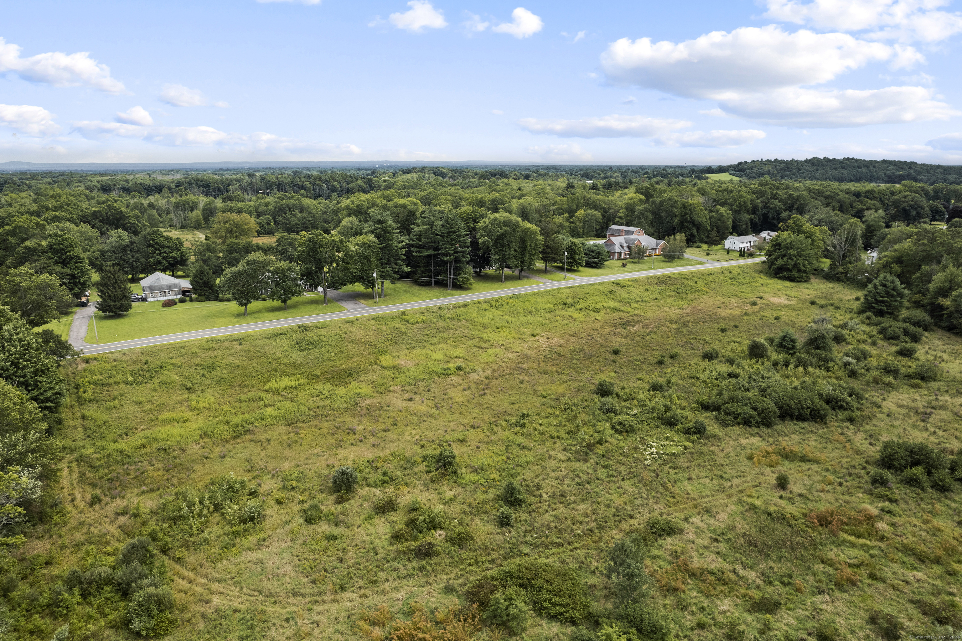 South Stone Street Suffield, CT 06078 - Photo 14 of 15 a view of a city with lush green forest