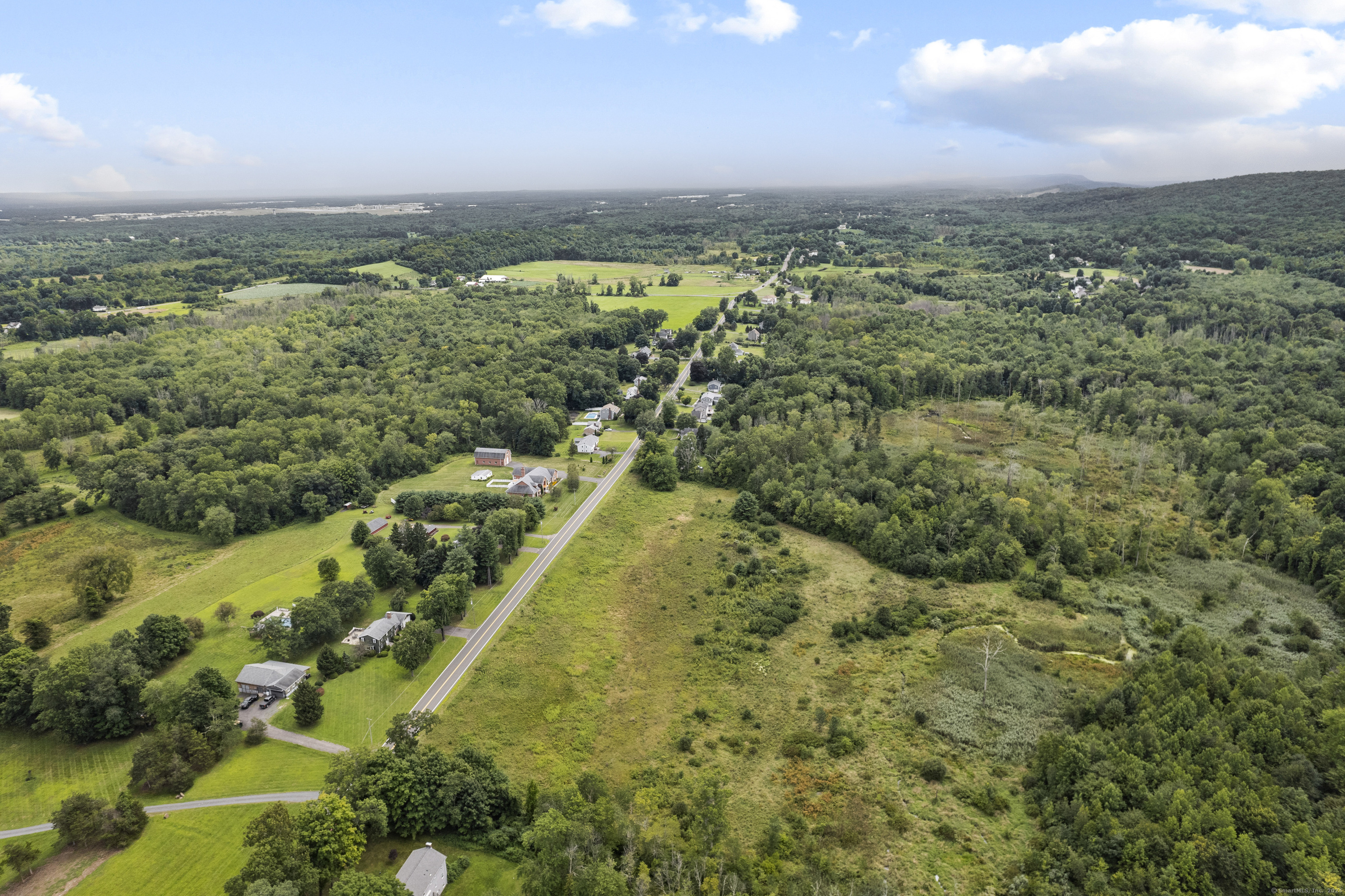 South Stone Street Suffield, CT 06078 - Photo 7 of 15 an aerial view of residential houses with outdoor space and trees