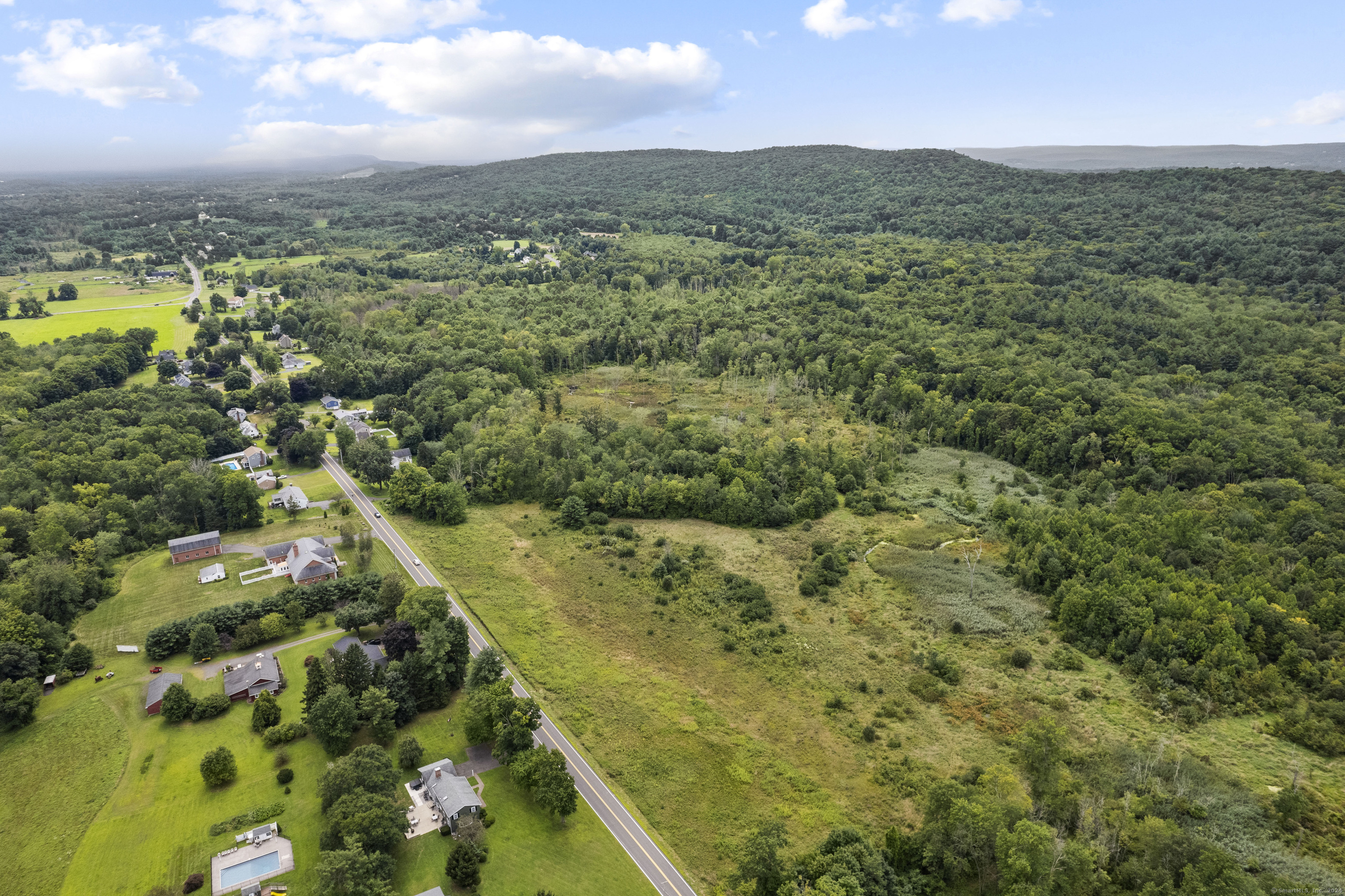 South Stone Street Suffield, CT 06078 - Photo 8 of 15 a view of a lake with a city