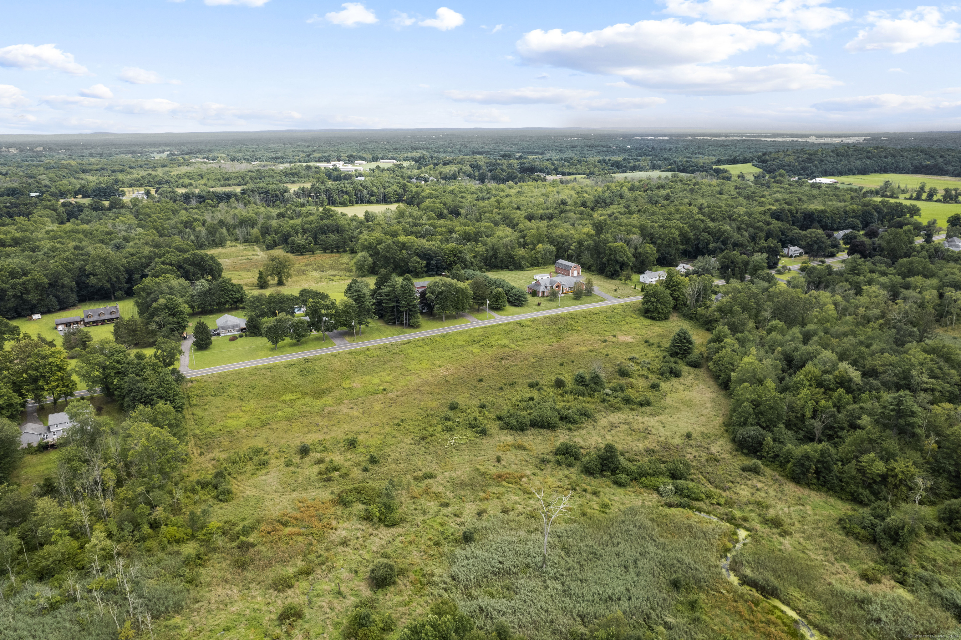South Stone Street Suffield, CT 06078 - Photo 9 of 15 an aerial view of residential houses with outdoor space and trees