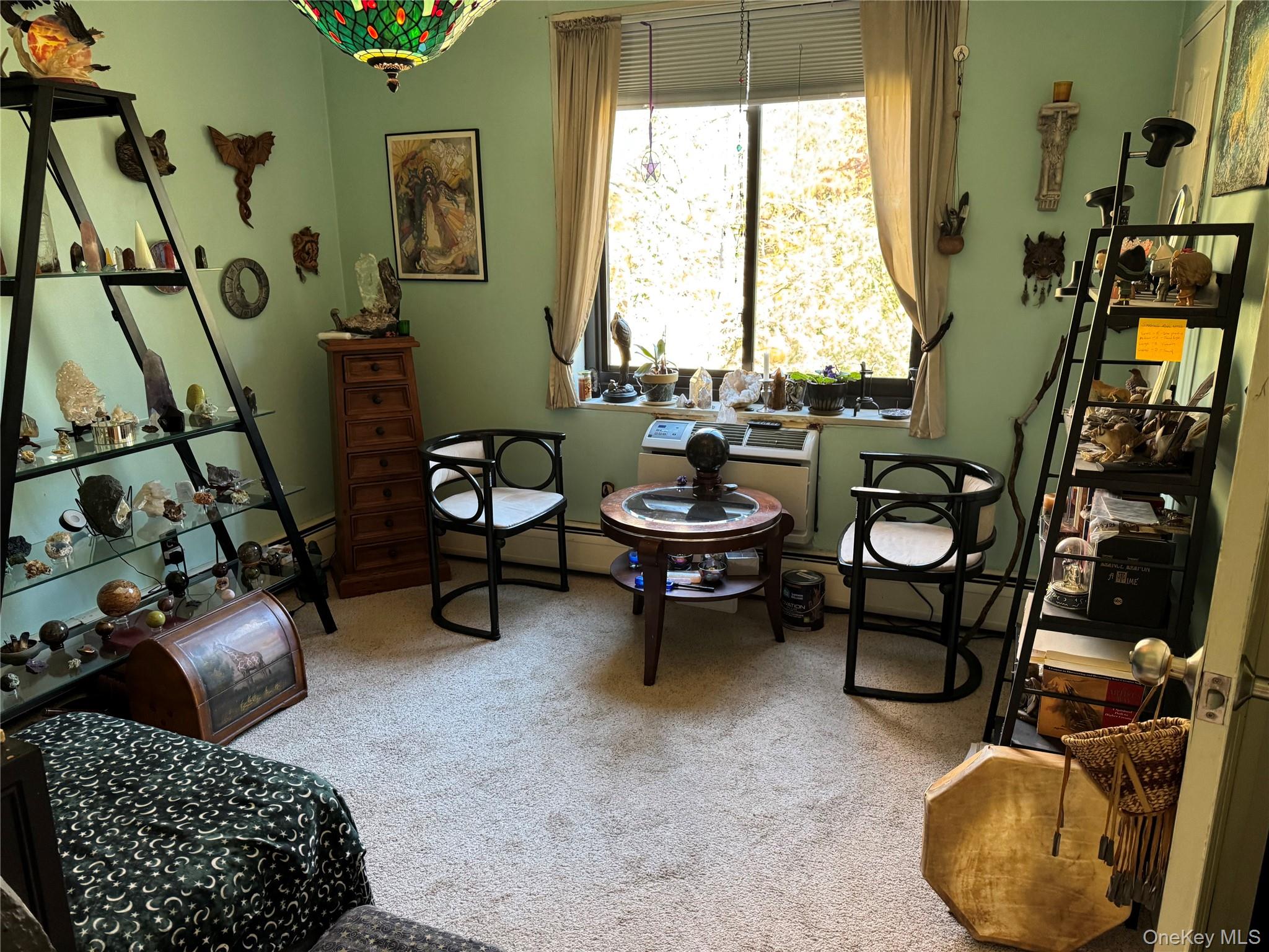1101 Midland Avenue, Unit 402 Bronxville, NY 10708 - Photo 16 of 20 a living room with furniture and a window