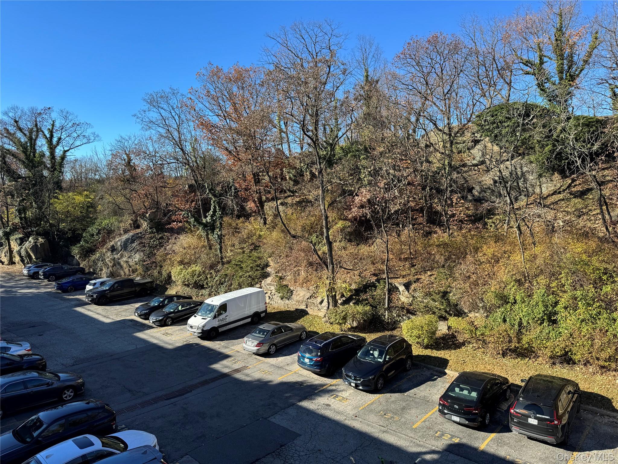1101 Midland Avenue, Unit 402 Bronxville, NY 10708 - Photo 20 of 20 a view of a backyard with sitting area