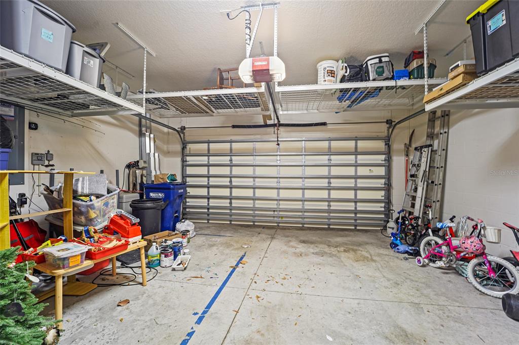 8903 Arabella Lane Seminole, FL 33777 - Photo 40 of 47 a view of a storage room with a lot of stuff