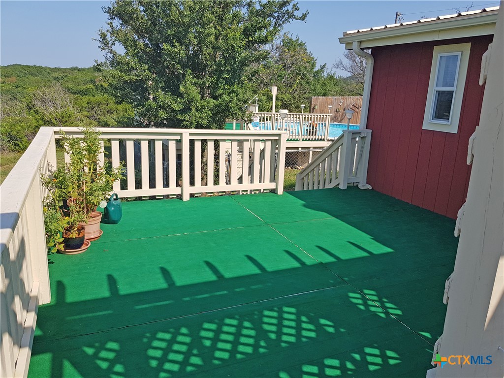 935 County Road 4820 Kempner, TX 76539 - Photo 14 of 48 a view of a deck with a small yard