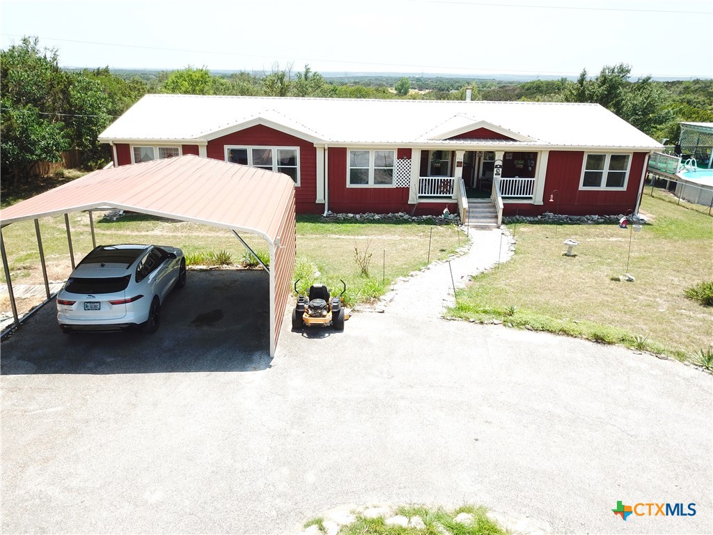 935 County Road 4820 Kempner, TX 76539 - Photo 2 of 48 a view of a house with pool and chairs