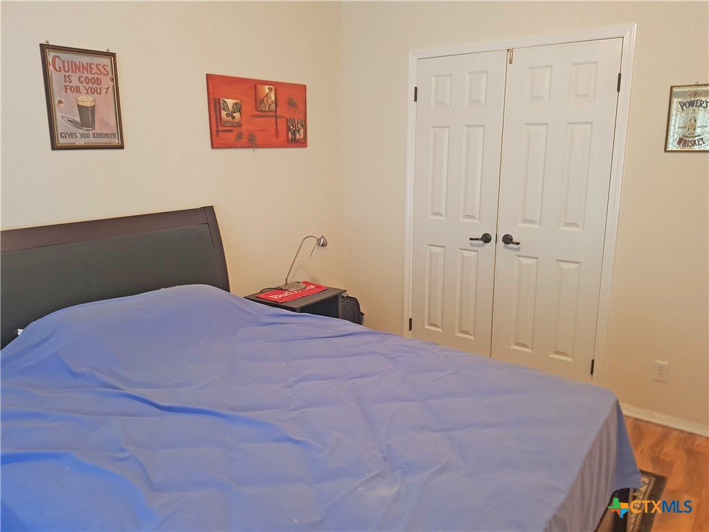 935 County Road 4820 Kempner, TX 76539 - Photo 40 of 48 a bedroom with a bed and a closet