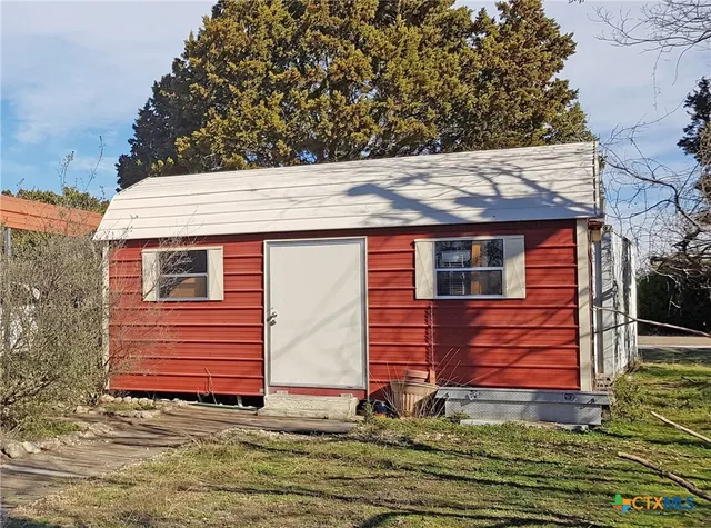 a car parked in front of a house
