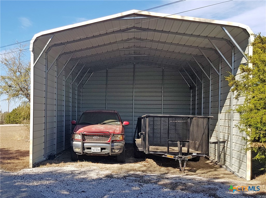 935 County Road 4820 Kempner, TX 76539 - Photo 47 of 48 a car parked in front of a house