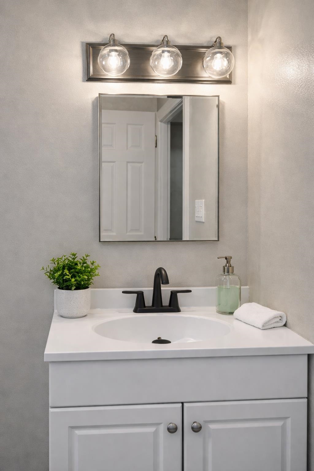 3300 Keystone Avenue Memphis, TN 38128 - Photo 6 of 18 a bathroom with a sink and a mirror