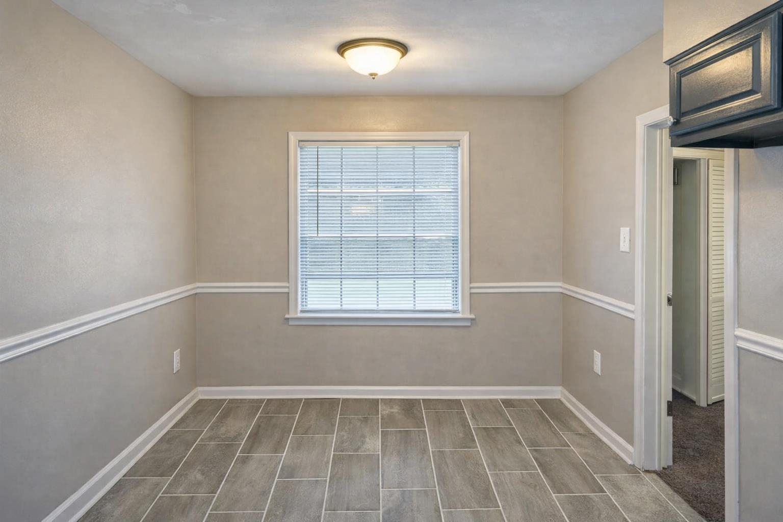 3300 Keystone Avenue Memphis, TN 38128 - Photo 8 of 18 an empty room with windows