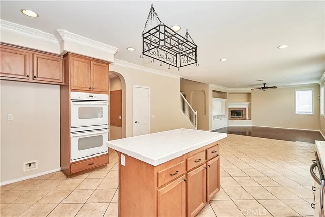 a kitchen that has a lot of cabinets in it