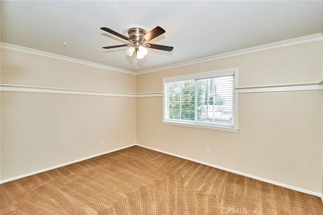 a view of a big room with wooden floor and closet