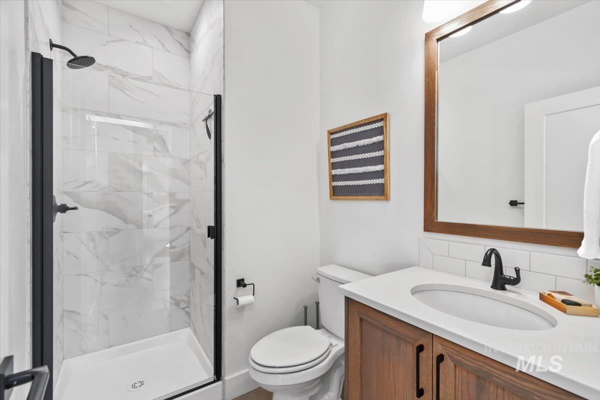 11379 West Helenium Drive Star, ID 83669 - Photo 19 of 50 Full bath with a marble finish shower and vanity