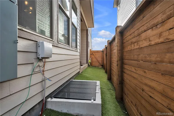 a view of house with backyard