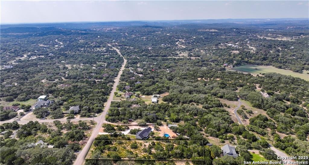 8009 Kenilworth Boulevard Spring Branch, TX 78070 - Photo 2 of 4 an aerial view of multiple house