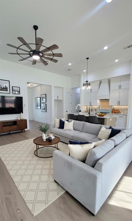 1106 East Sixth Street Springtown, TX 76082 - Photo 11 of 29 a living room with furniture and a flat screen tv