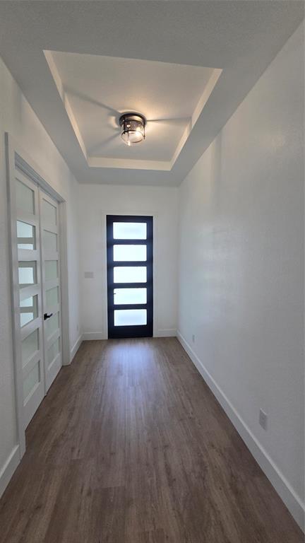 1106 East Sixth Street Springtown, TX 76082 - Photo 15 of 29 an empty room with windows and closet