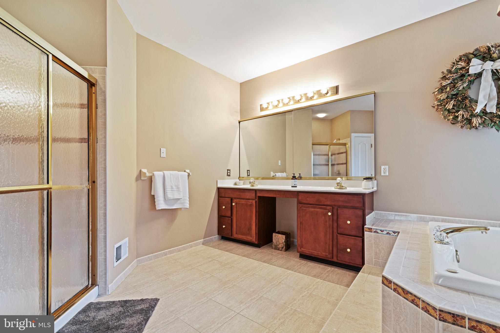 311 Trimble Lane Exton, PA 19341 - Photo 22 of 35 Double bowl vanity, linen closet and shower