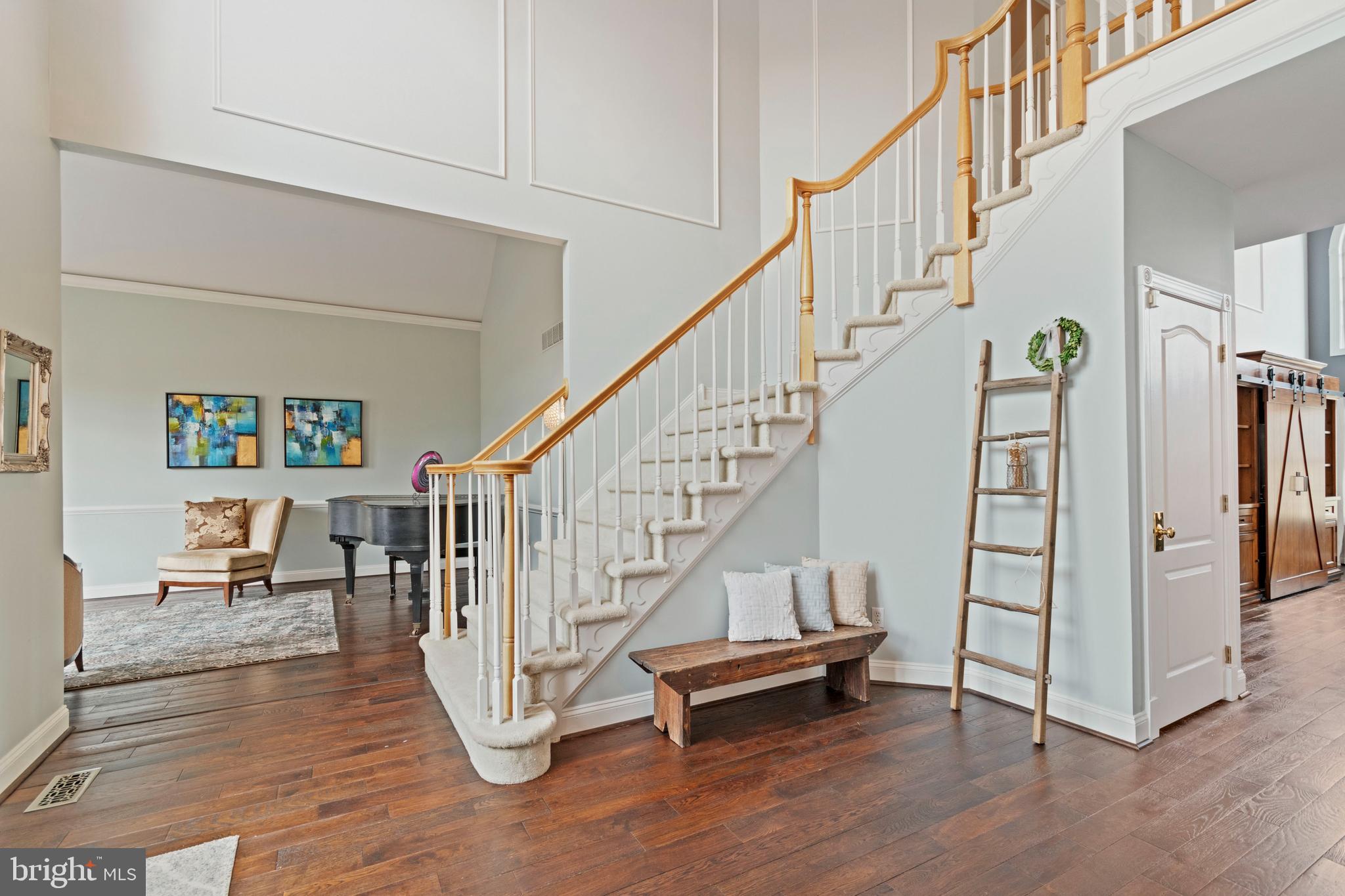 311 Trimble Lane Exton, PA 19341 - Photo 3 of 35 Two story Fireplace with turning staircase