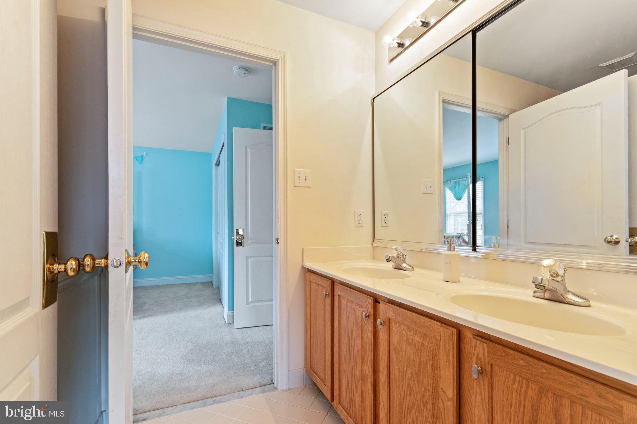 311 Trimble Lane Exton, PA 19341 - Photo 33 of 35 Upper level bath features a double bowl vanity.